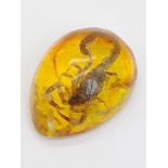 Release the Scorpion! Amber-coloured resin pendant or paperweight. 6cm