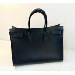 An Yves St Laurent (Saint Laurent) Sac du Jour Black Leather Tote Bag. Luxurious black calfskin