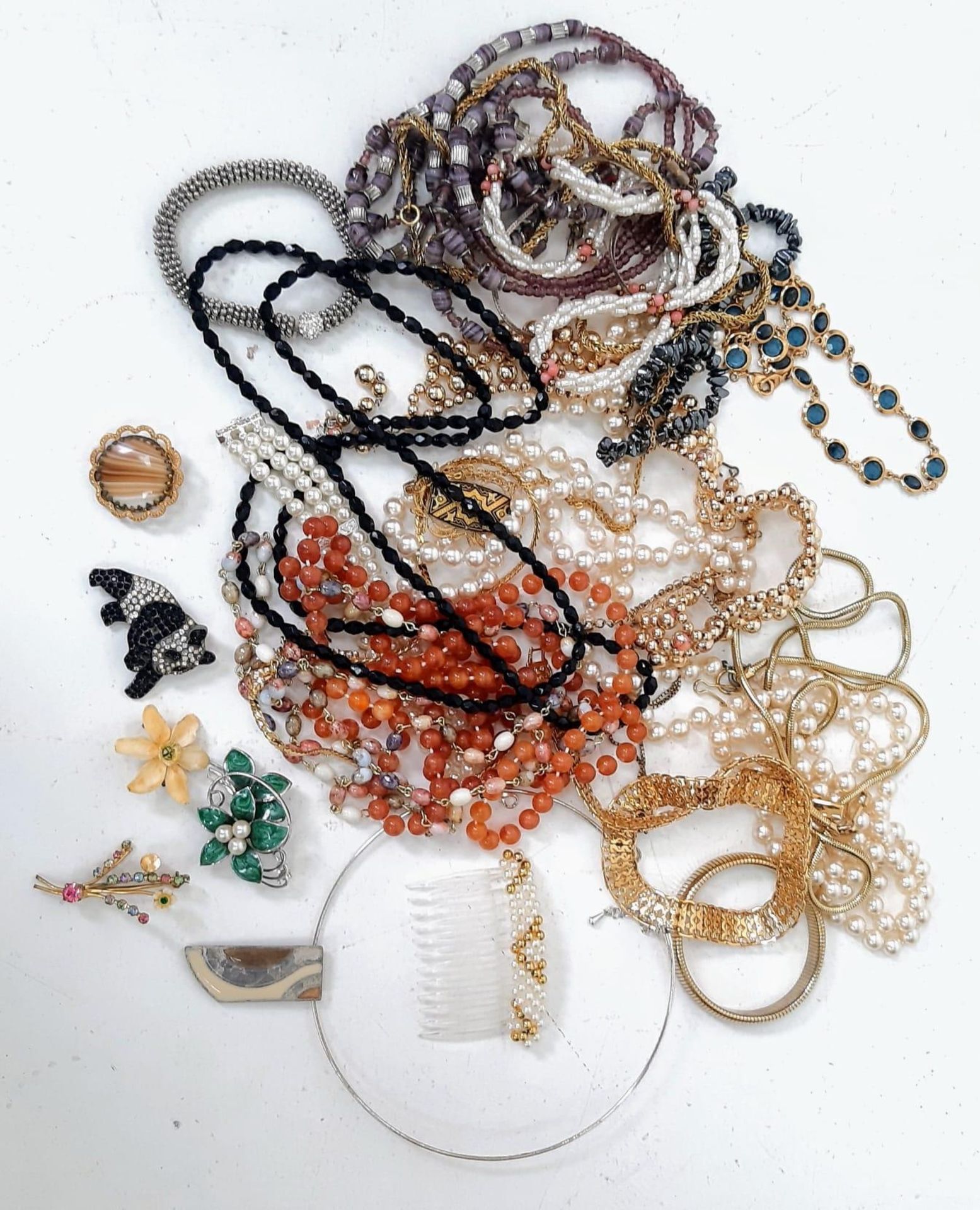 A Large Amount Of Assorted Costume Jewellery. Please see Photos for Full Details and Conditions.