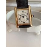 Ladies vintage CARTIER TANK MUST 2415 Wristwatch. Serial number 076519PL. Finished in 18 carat