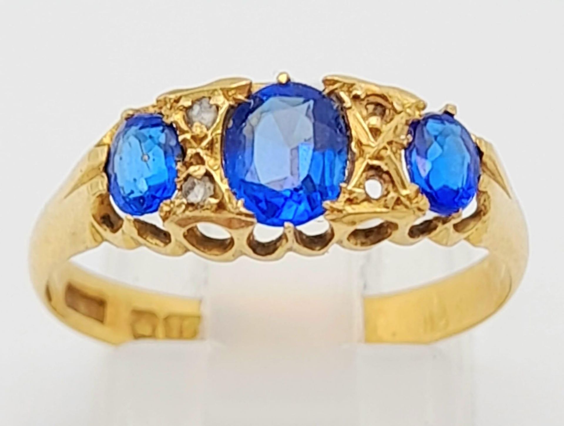 A Gorgeous Antique (1803) Georgian 18K Sapphire Ring. Three Royal blue oval sapphires. There are two