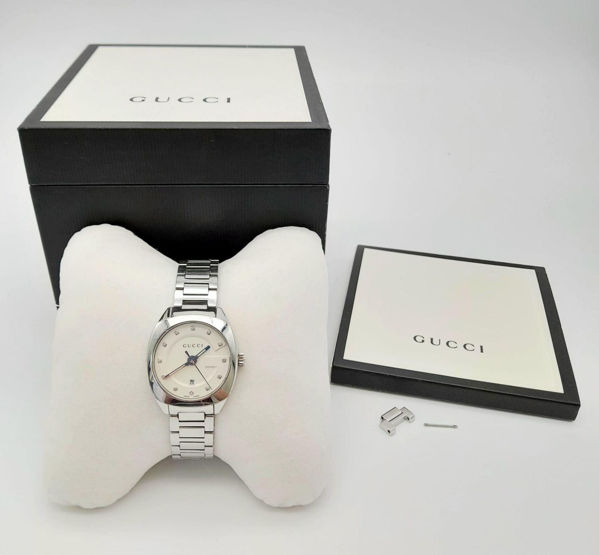 A Gucci Quartz Ladies Watch. Stainless steel strap and case -29mm. Cream dial with date window and - Image 8 of 9