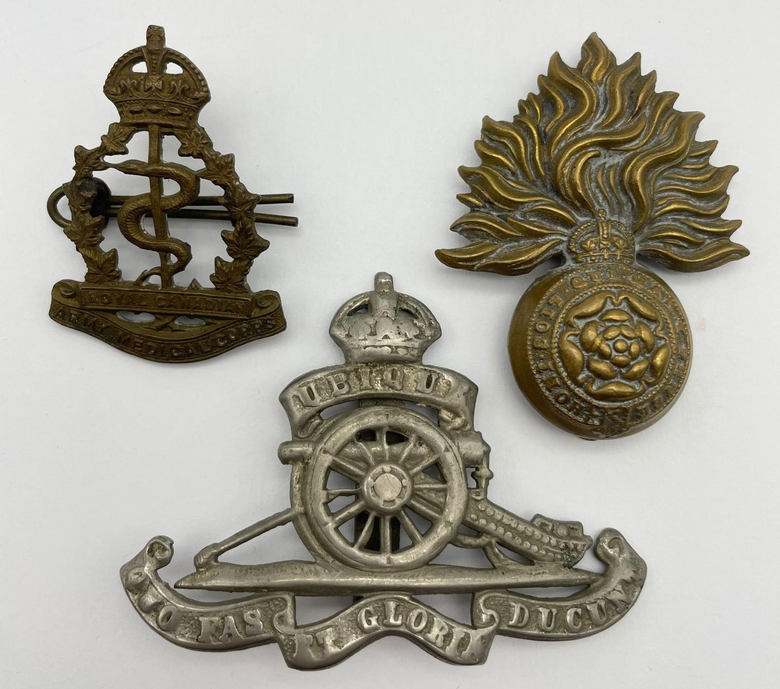 Three Military Cap Badges: WW1 City of London, Royal Canadian Army Medical Corp and the WW1