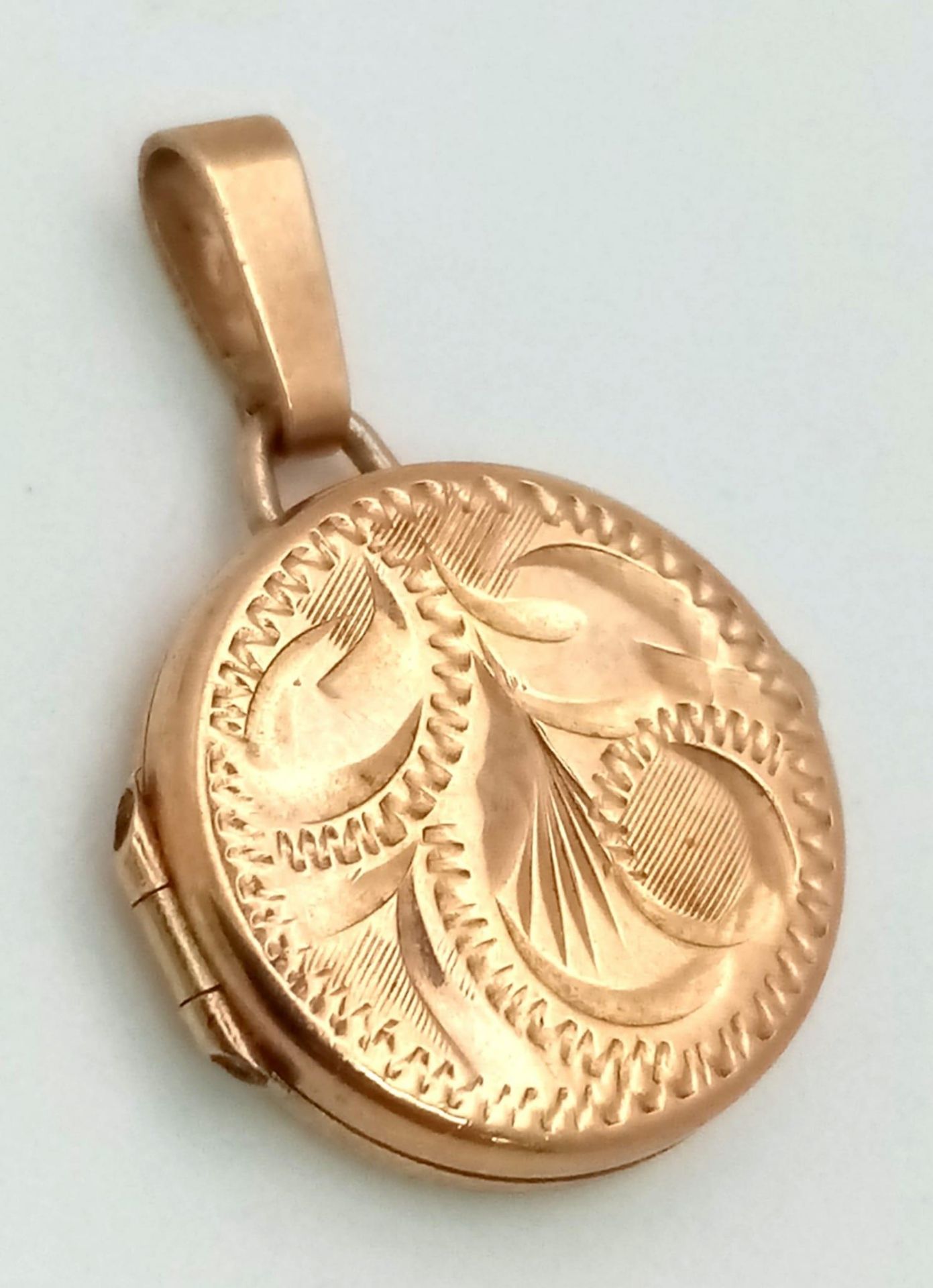 A Vintage 9K Yellow Gold Small Circular Locket Pendant. 2cm 2.47g