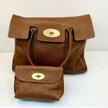 A Mulberry Bayswater Brown Leather Bag with Matching Pouch. Soft brown leather exterior with