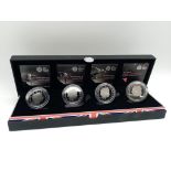 A Royal Mint London Silver Proof £5 Commemorative Coin Set. Four silver proof coins counting down to