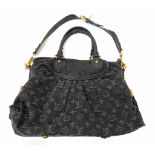 A Louis Vuitton Denim Noir Monogram Hand/Shoulder Bag. Denim exterior with black leather trim and