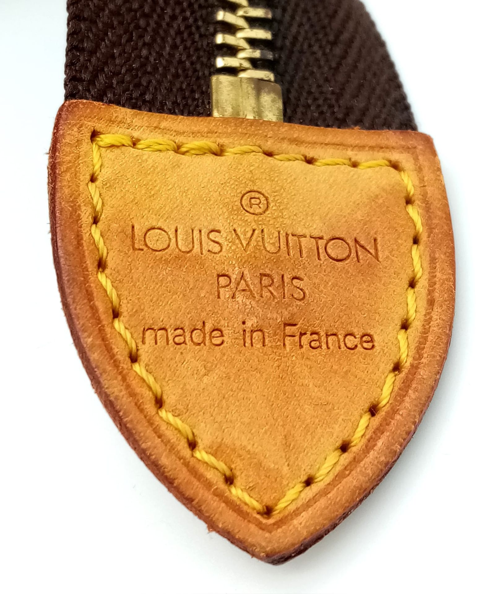 A Louis Vuitton Monogram Canvas Pouch. 25cm x 20cm. In good condition but please see photos. Ref: - Image 5 of 6