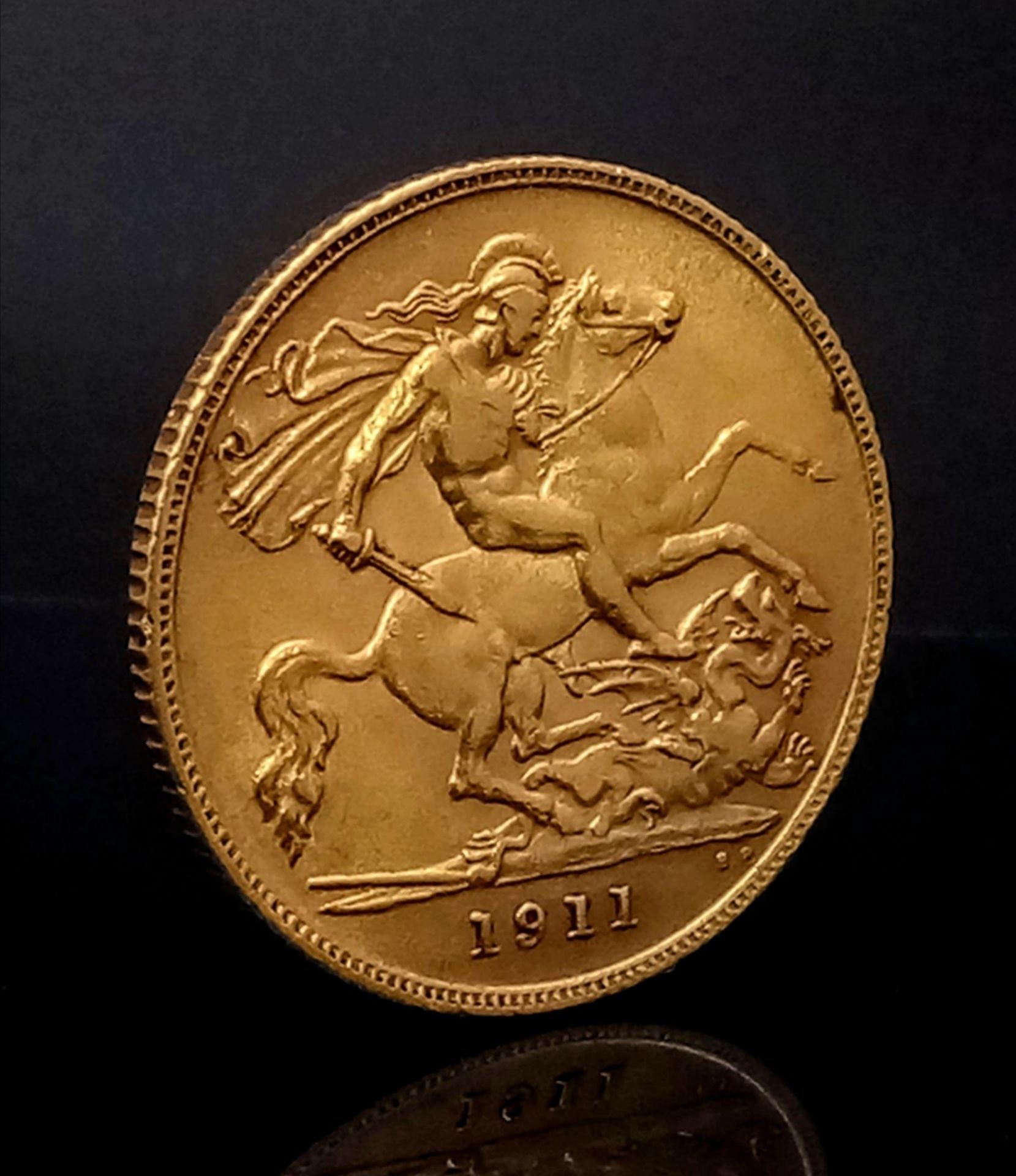 22k yellow gold half sovereign coin with King George, dated 1911, 3.99g