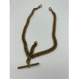 Antique heavy metal double Albert watch chain marked Canadian Gold. However,these chains were made