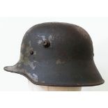 Inter War Period German Friekorps Helmet. A WW1 Imperial German M18 Helmet shell with a 1935 model