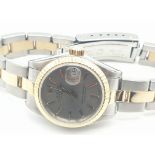 A Rolex Oyster Perpetual Datejust Ladies Watch. Bi-metal strap and case - 26mm. Silver-tone dial.