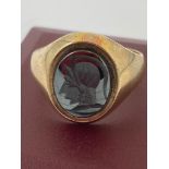 9 carat YELLOW GOLD RING with intaglio centurion mounted to top in grey Haematite gemstone. Approx