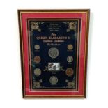 A Framed Queen Elizabeth II Golden Jubilee Coin Collection. Eight commemorative coins in total. In