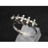 A 14k White Gold 5 Stone Diamond Ring. 0.37ct Diamond. Total Weight 3.11g. Size N. 8054