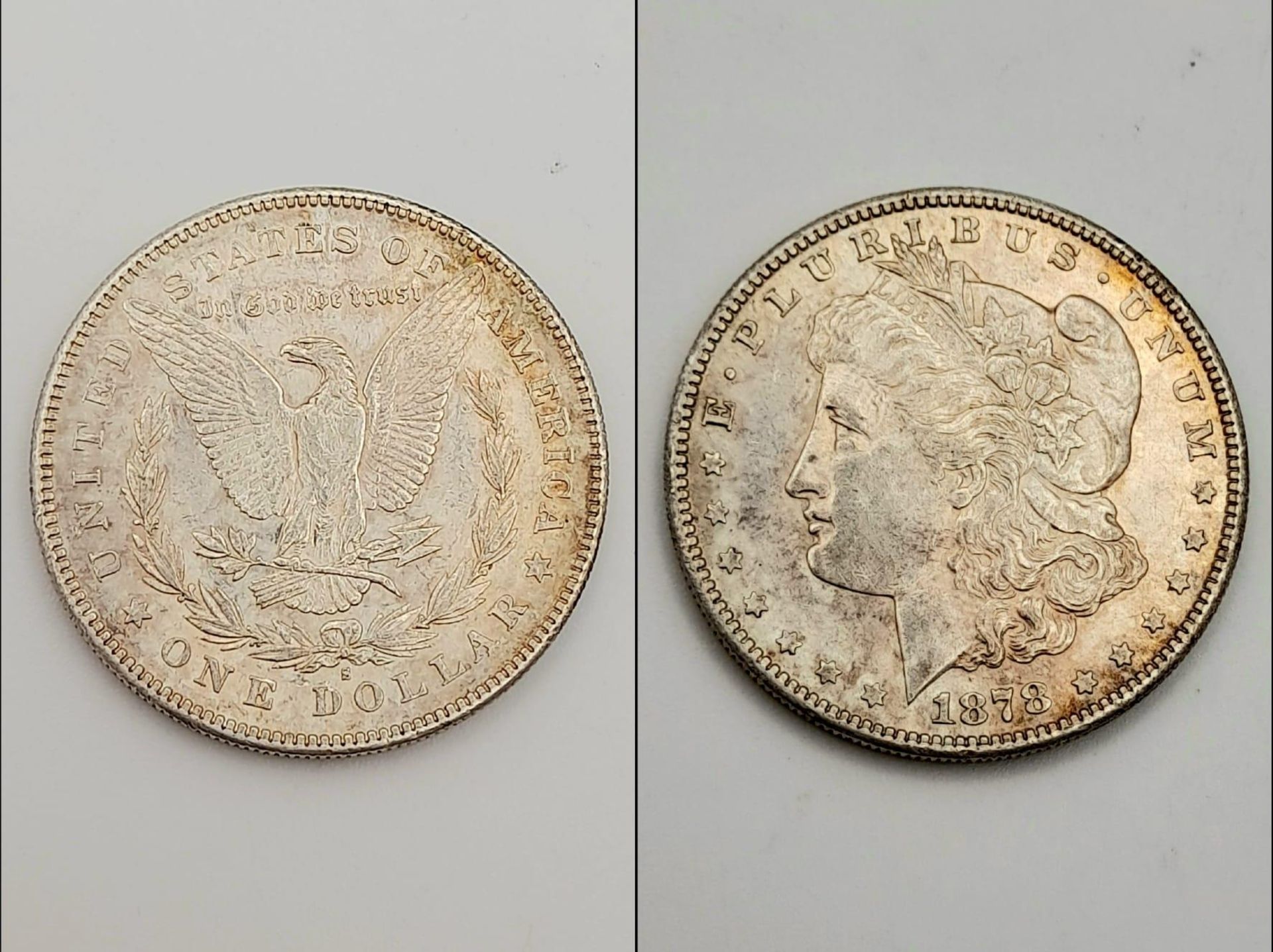 An 1878 (First Year of Issue) Morgan Dollar (San Francisco Mint) About Uncirculated Condition (