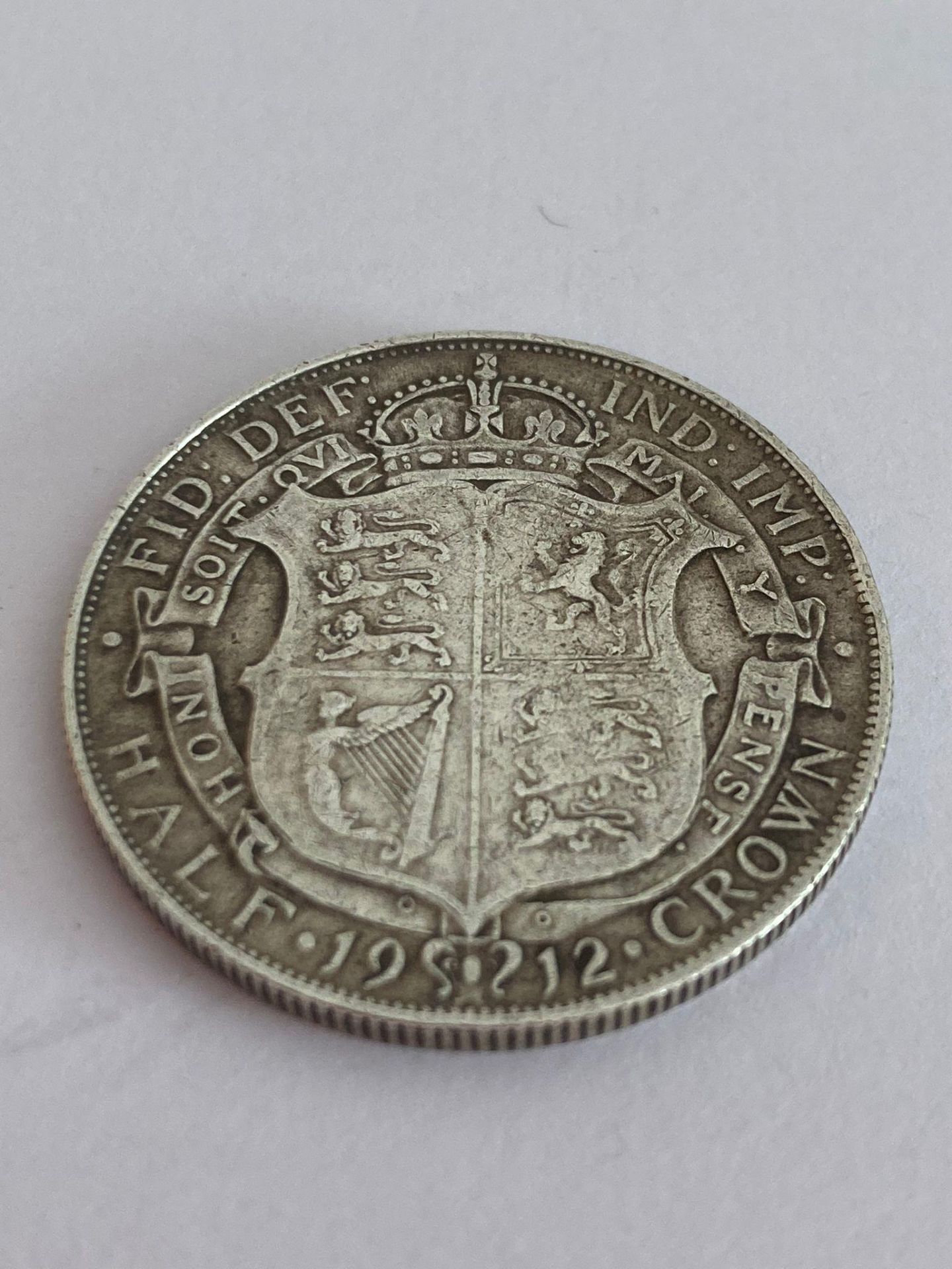 SILVER HALF CROWN 1912 in Extra fine condition, Having clear detail and words to both sides with