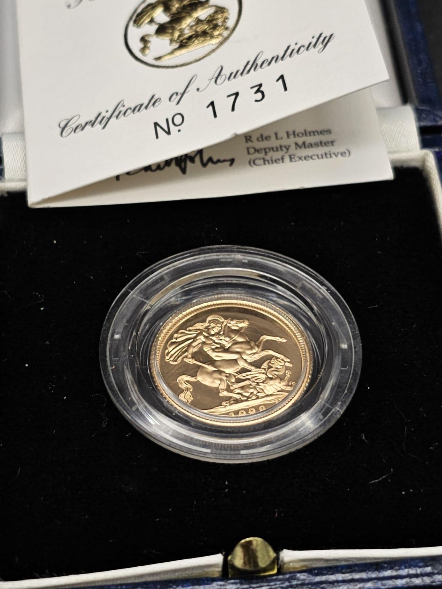 A 1998 Royal Mint 22K Gold Half Sovereign Coin. This limited edition proof coin ( No. 1731) comes in - Image 6 of 8