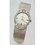 A Vintage 18K White Gold and Diamond Omega Ladies Watch. 18k gold bracelet and oval case - 21mm.