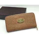 A Mulberry Brown Leather Clutch Bag/Wallet. Textured leather exterior with an inner zipped