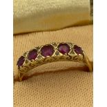 Beautiful 18 carat GOLD and RUBY RING having 5 RUBIES set to top separated with Diamond detail. Full