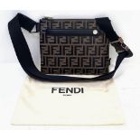 A Fendi Black and Brown Monogram Leather Messenger Bag. Silver-tone hardware. Adjustable shoulder