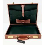 London leather attaché case by Simpson of London, unused, shop soiled.