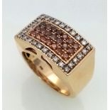 14K YELLOW GOLD WHITE & COGNAC DIAMOND RING. TOTAL WEIGHT 14G. SIZE S. 0.80CT DIAMOND