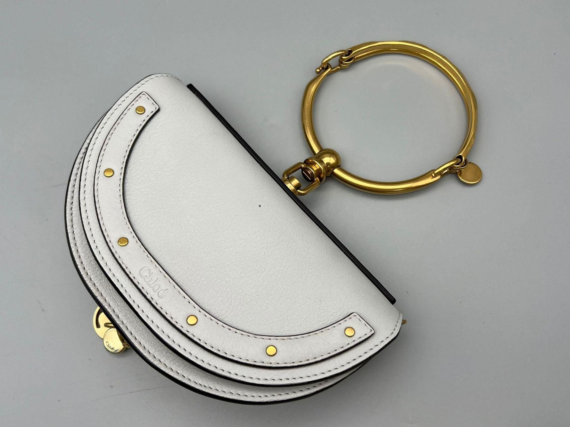 A Very Popular Chloe Bracelet Nile Leather Flap Handbag. Grey leather exterior with serious gold-