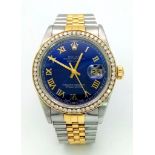 A ROLEX OYSTER PERPETUAL DATEJUST IN BI-METAL WITH STUNNING BLUE DIAL , DIAMOND BEZEL AND ROMAN