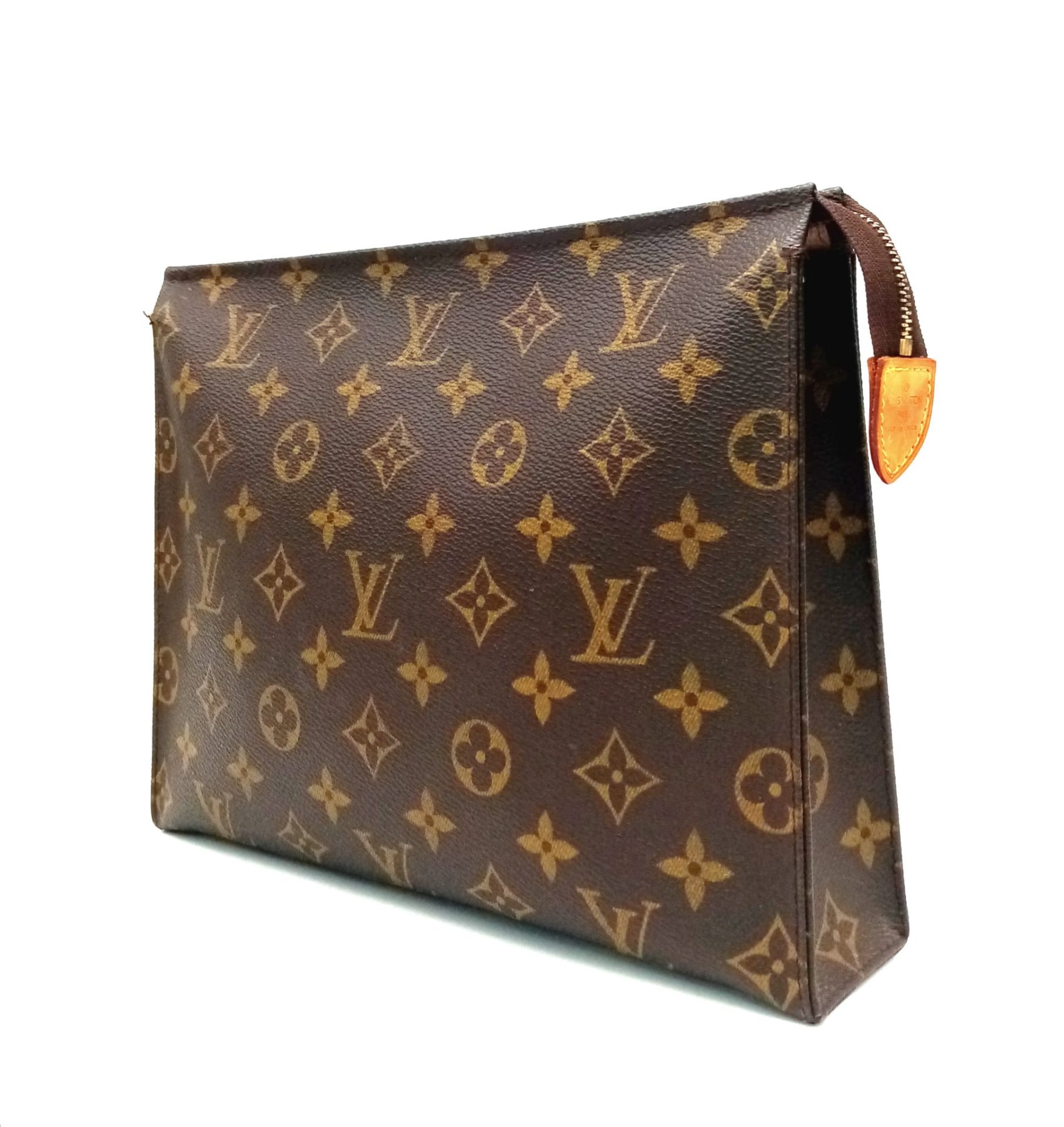 A Louis Vuitton Monogram Canvas Pouch. 25cm x 20cm. In good condition but please see photos. Ref: - Image 2 of 6