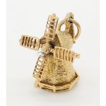 9K YELLOW GOLD WINDMILL CHARM WITH SPINNING WHEEL 3.37G