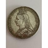 VICTORIAN SILVER CROWN 1891 in extra fine condition having raised definition to both sides.