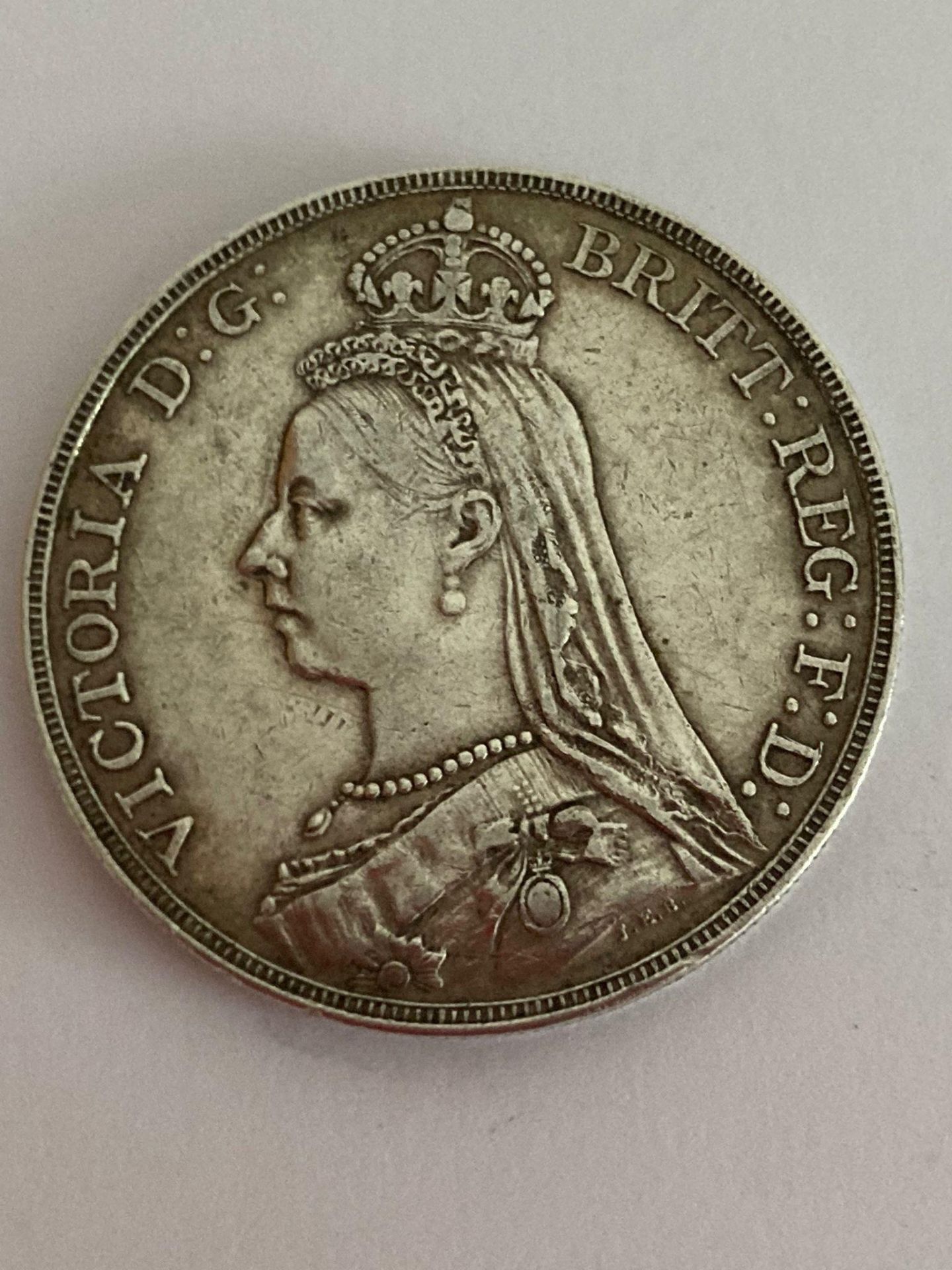 VICTORIAN SILVER CROWN 1891 in extra fine condition having raised definition to both sides.