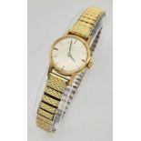 A Vintage 1969 Omega 9K Gold Ladies Watch. Expandable gold-plated bracelet. 9k gold case - 20mm.