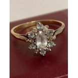 Vintage 9 carat GOLD RING having a Beautiful oval cut AQUAMARINE set to top with a DIAMOND and