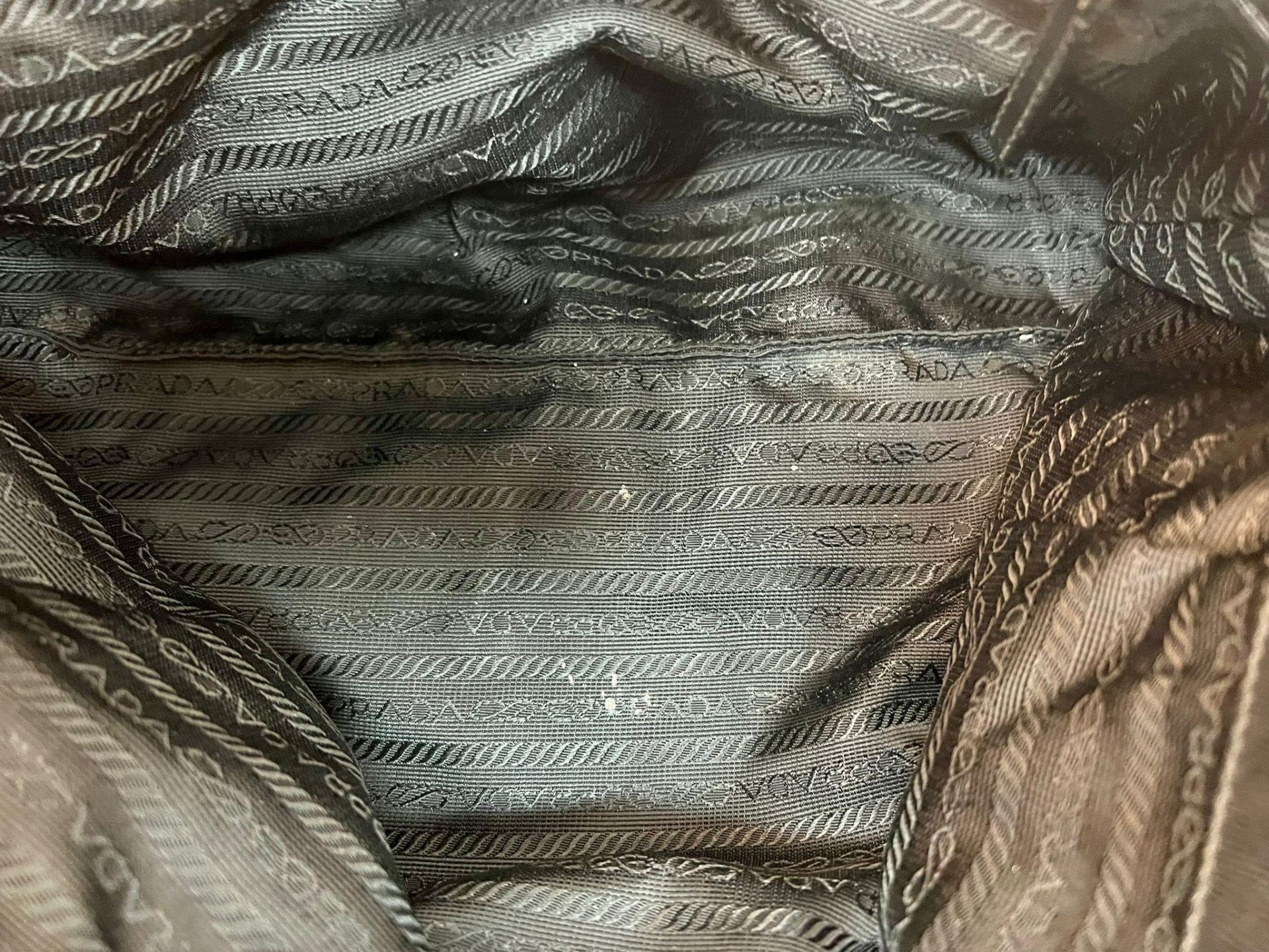 A Prada Black Cloth Bag with Black Leather Trim and Handle. 30cm x 25cm. Zipped inner compartment. - Bild 7 aus 8