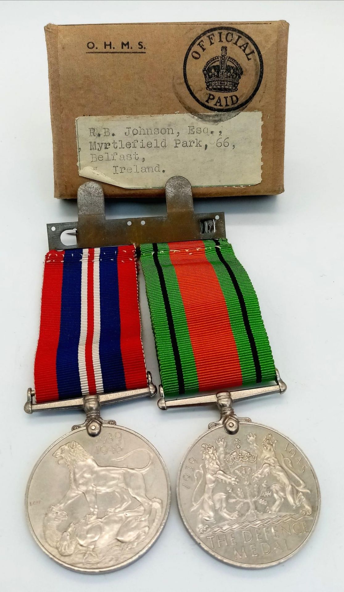 Two British WW2 George VI Medals - The Defence Medal and The War Medal, both with ribbons and a