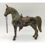 A Vintage Bronze Horse Sculpture with Removable Saddle. Nice patina. 25cm tall by 28cm width.
