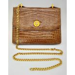 A Gucci Brown Reptilian Skin Brown Leather Hand/Shoulder Bag. Note - shoulder and hand strap are