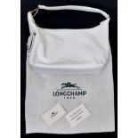 A Longchamp White Leather Handbag with Dust-Cover. 29cm x 19cm. Ref: 13029