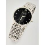 A Ladies Gucci Black Dial Quartz Watch. Stainless steel strap and case - 34mm. In working order.