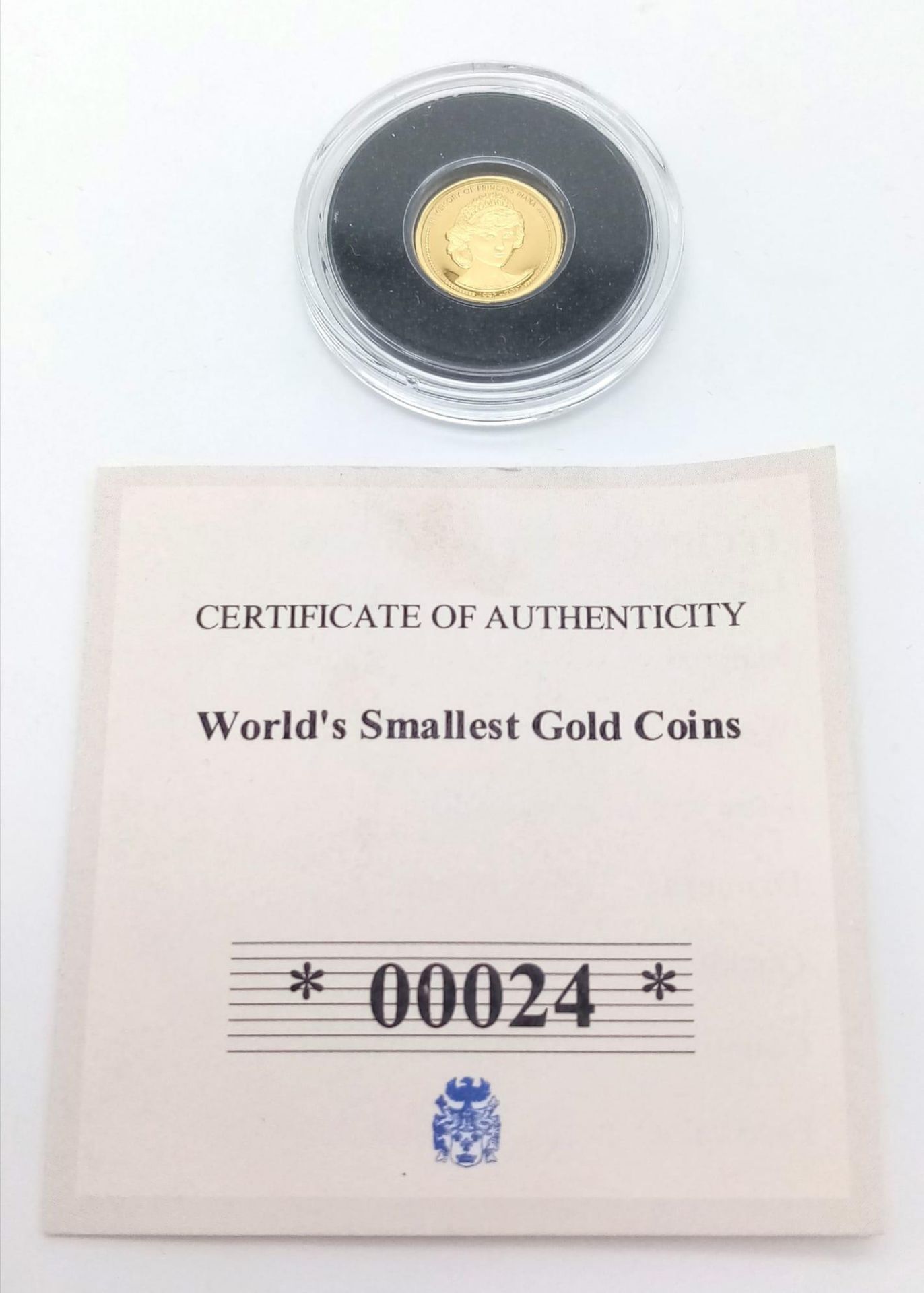 THE WORLDS SMALLEST GOLD COIN , 0.311 OF 24K GOLD PROOF QUALITY $5FROM THE COOK ISLANDS DATED - Image 3 of 3