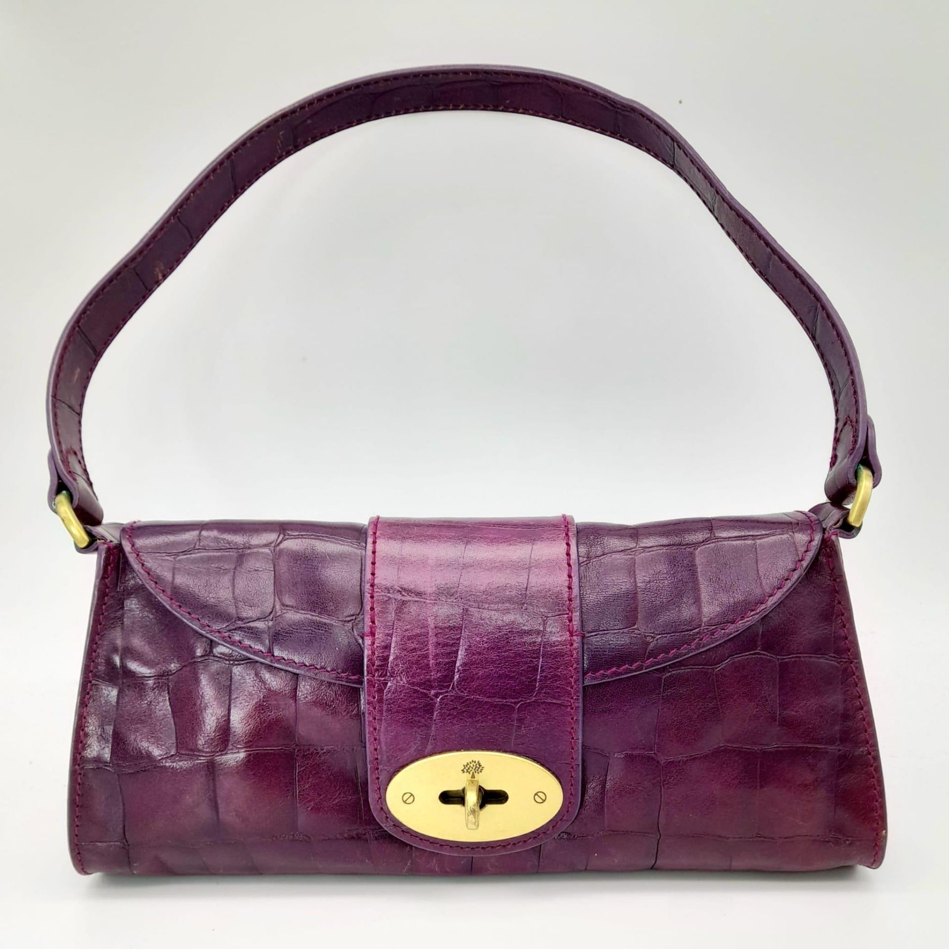 A Mulberry Purple Leather Baguette Handbag. 24cm x 12cm. Ref: 13004