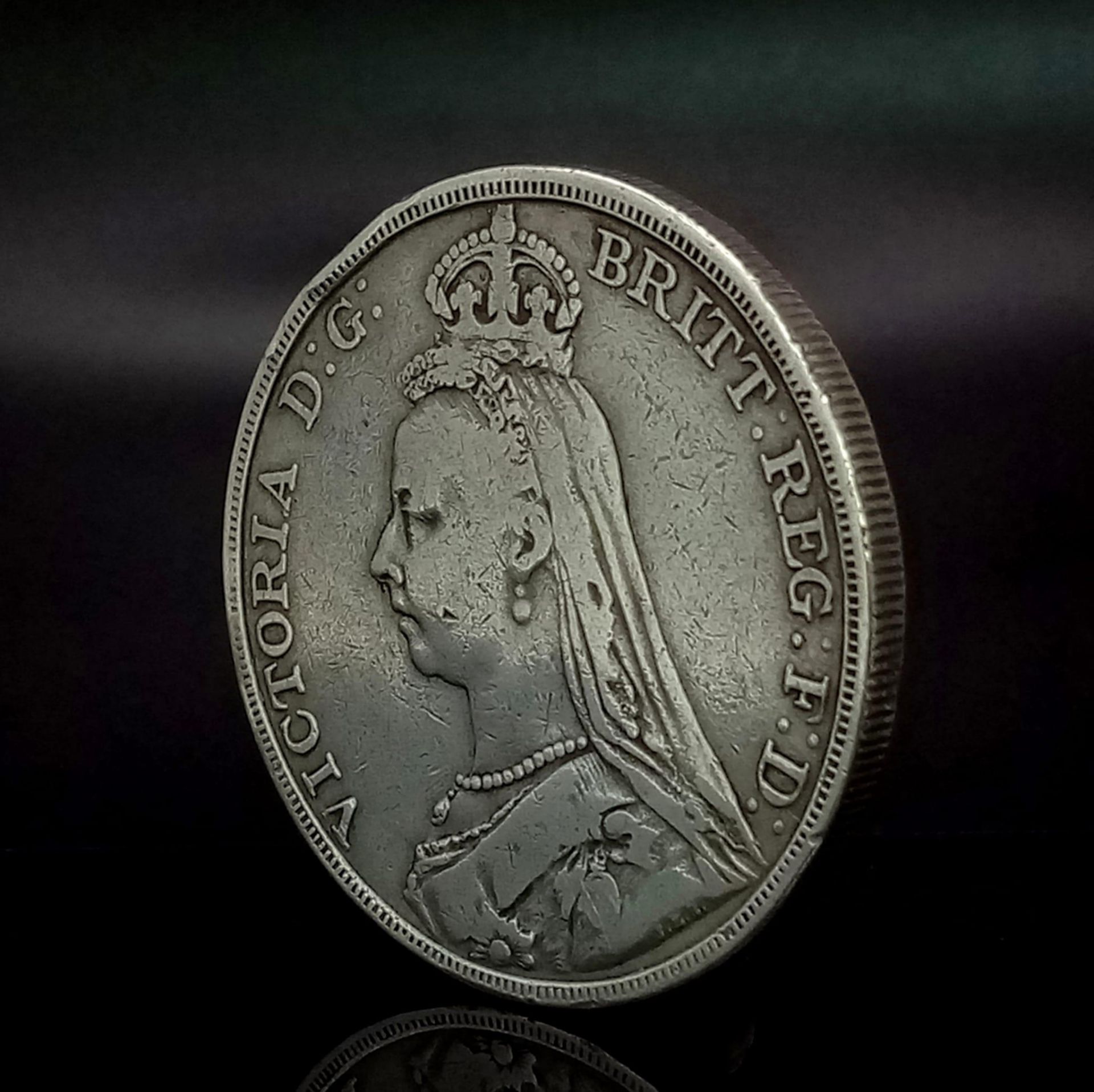 An 1892 Queen Victoria Silver Crown Coin. Please see photos for conditions. - Image 2 of 3