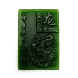 A Chinese Green Jade Dragon Pendant. 4.5cm x 3cm.