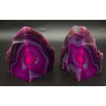 A pair of shocking fuchsia-pink banded agate bookends. Height: 11 cm, weight: 1238 g.