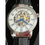 Gentlemans STUHRLING AUTOMATIC SKELETON WRISTWATCH from MAX STUHRLING of NEW YORK. Finished in