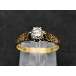 An 18K Yellow Gold Diamond Solitaire Ring. 0.35ct. Size L. 2.96g total weight.