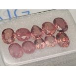 A 3.57ct Parcel of Ten Natural Unmounted Rubies. Comes with an AIG Milan certificate. Presented in a